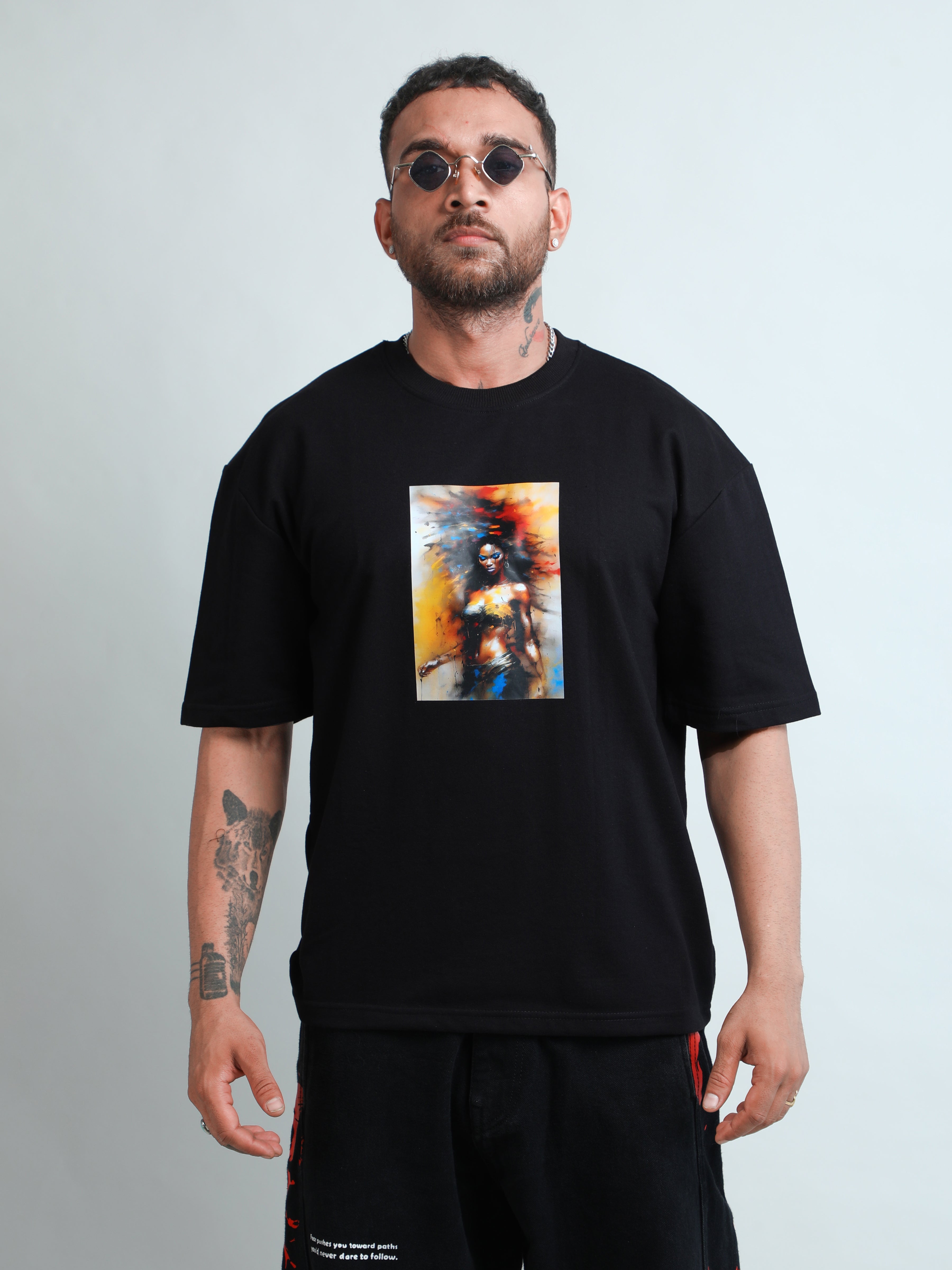 Black unisex oversized t-shirt with hot lady in colours print