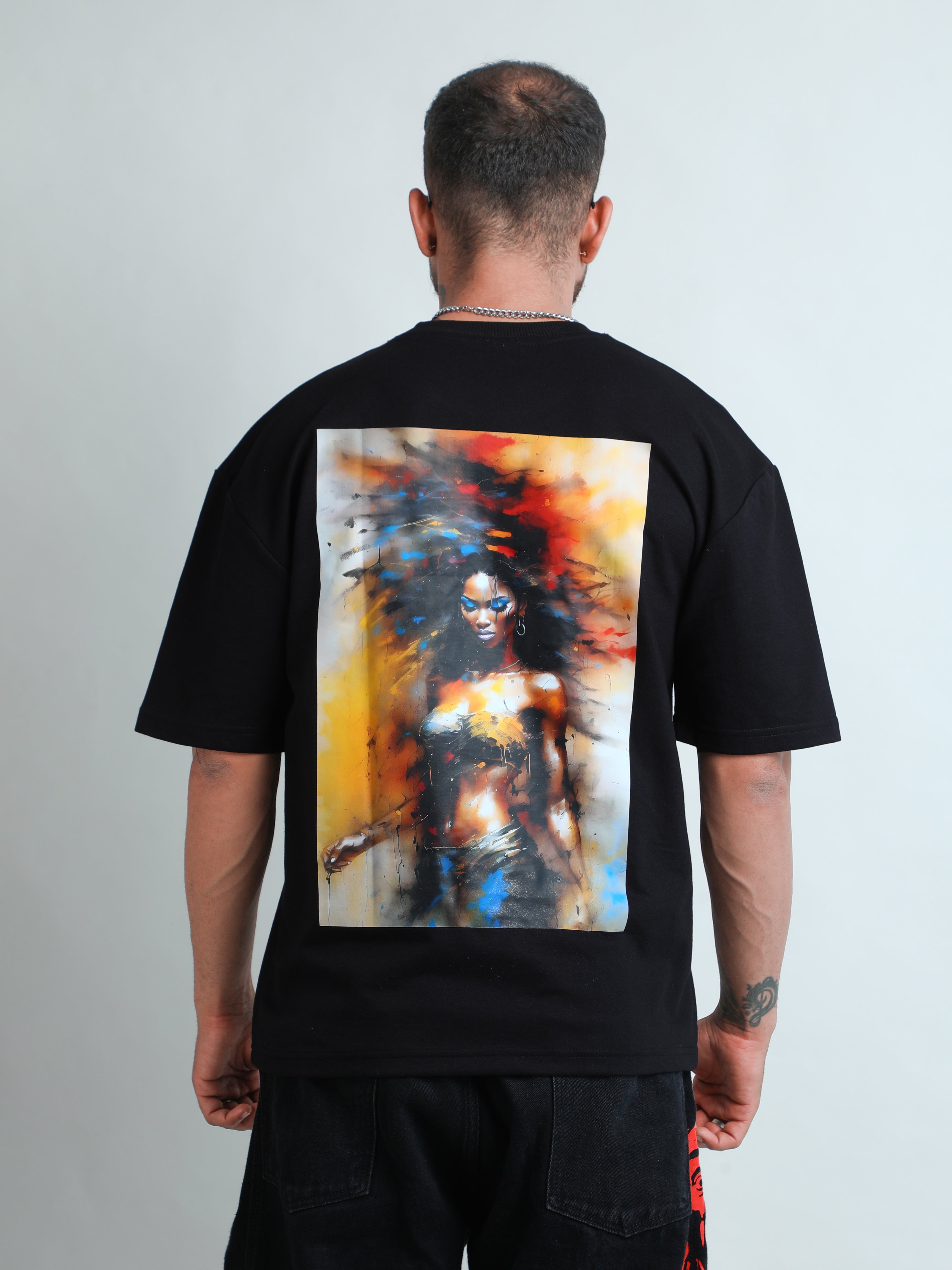 Black unisex oversized t-shirt with hot lady in colours print