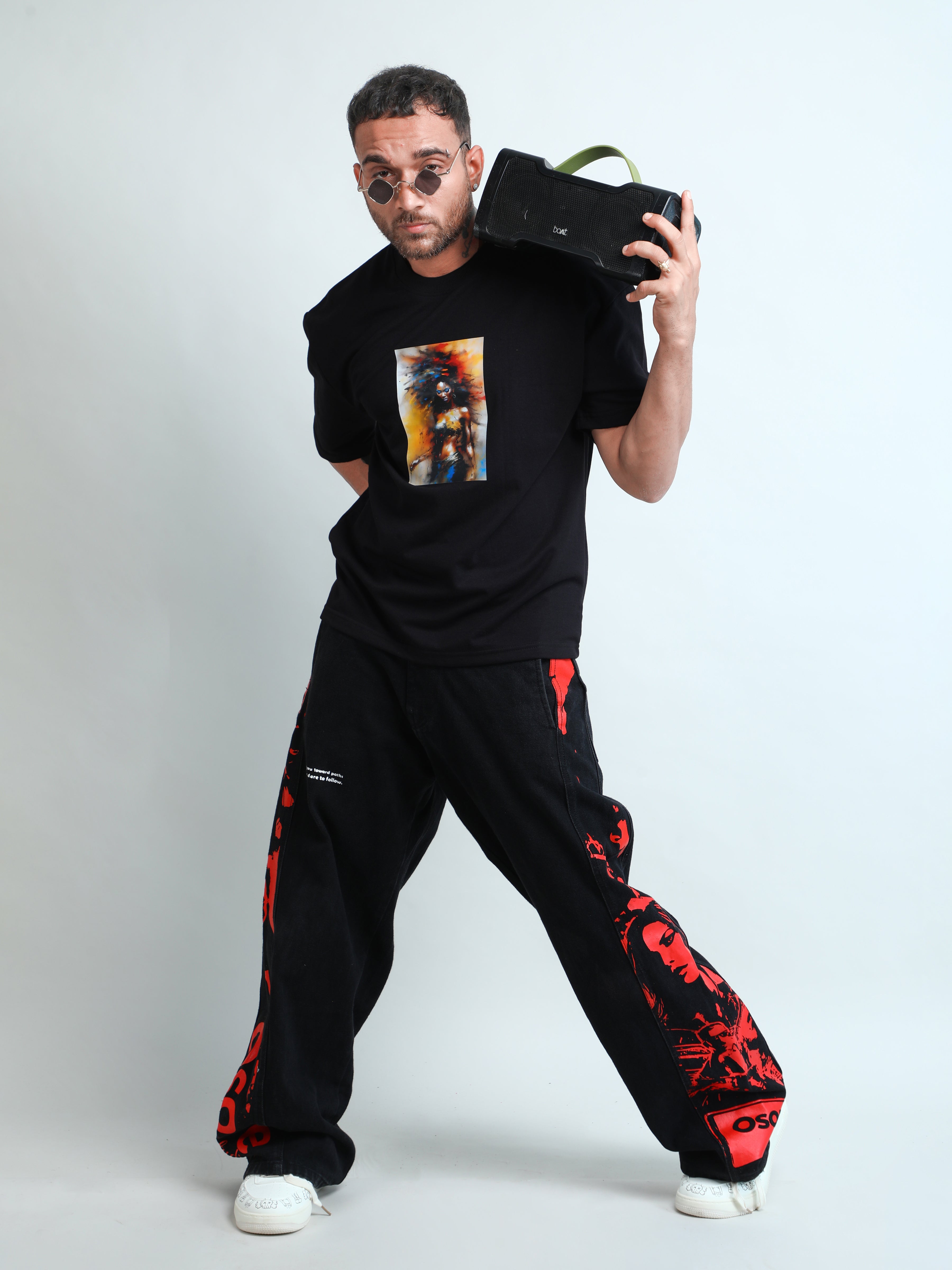 Black unisex oversized t-shirt with hot lady in colours print